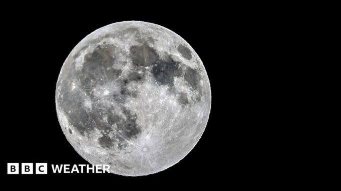 Thin, blue banner promoting the Cooler Than Me? weather game with text saying: 